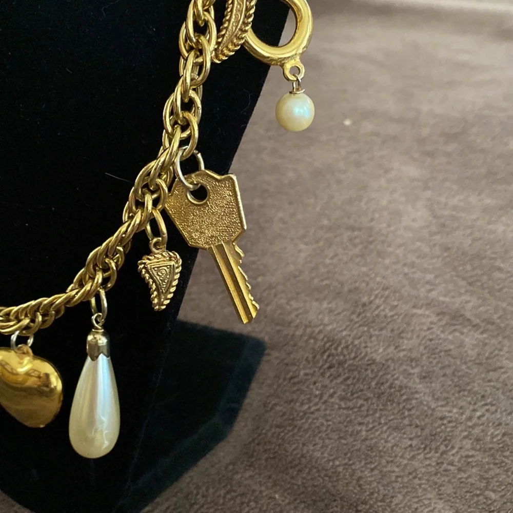 Vintage 1980s Rare Moschino Redwall 15 iconic brand gold charm necklace